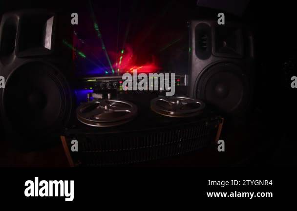 Old vintage reel to reel player and recorder on dark toned foggy  background. Analog Stereo Open Reel Tape Deck Recorder Player with Reels.  Selective focus Stock Video Footage - Alamy