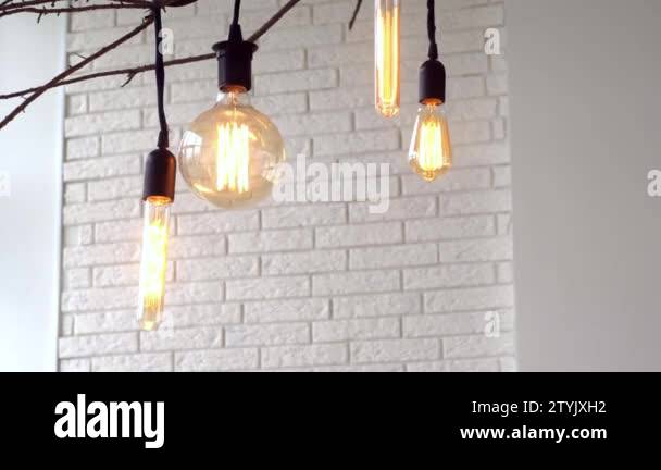 Vintage hanging lamps on white background of wall. Media. Glowing ...