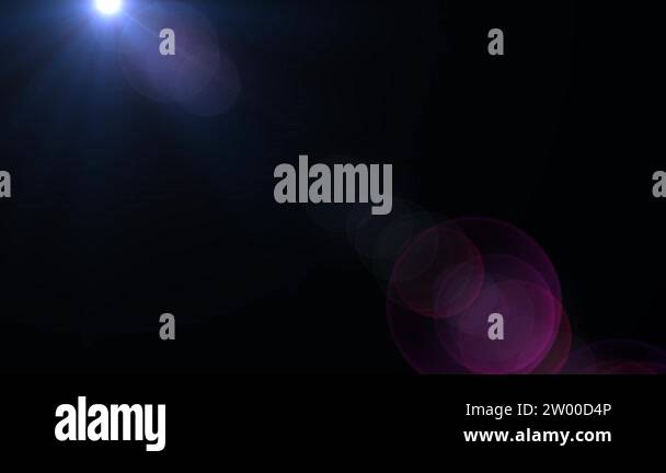 Moving lens flare effect on black background. 4k animation Stock Video ...