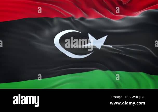 Libya flag waving in the wind with highly detailed fabric texture ...