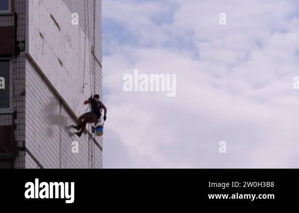 Image showcasing Industrial Climber Insulation of Facade Old High-Rise Building Using ...