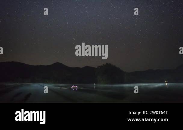night landscape view milky way and star reflection on water in dam ...