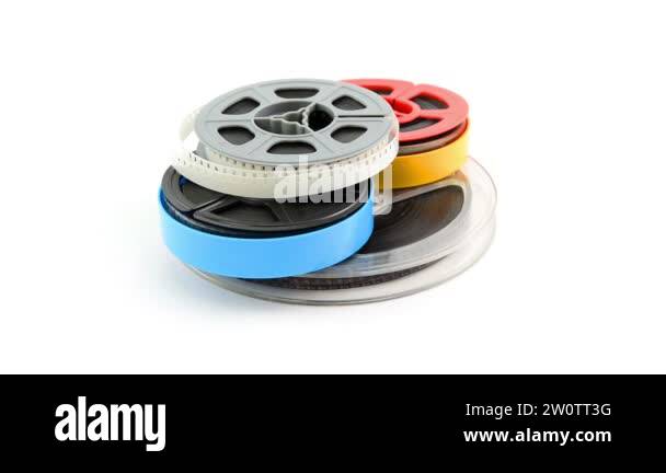 Film reels rotating on white background Stock Video Footage - Alamy