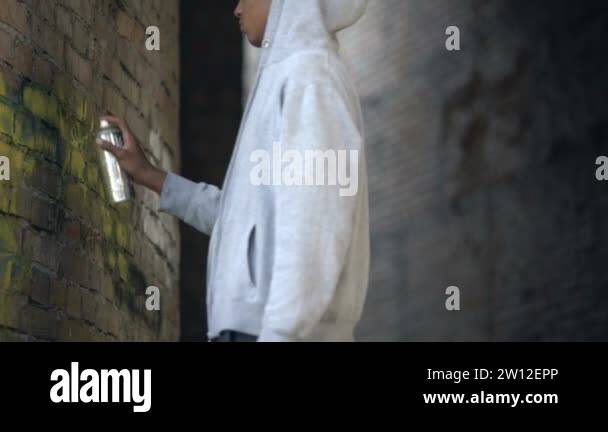 Male teen painting wall spray paint Stock Videos & Footage - HD and 4K ...