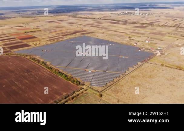 Zoom aerial view of Solar Panels Farm solar cell with sunlight. view of ...
