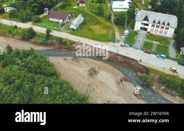 Destroyed Rural Road Aerial view road in the village which was destroyed by a flood on the ...