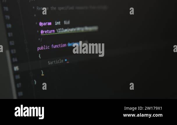 The programming job displayed on a big black computer screen with many ...