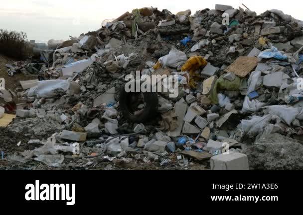 Industrial and household waste. Large garbage pile. Degraded garbage ...