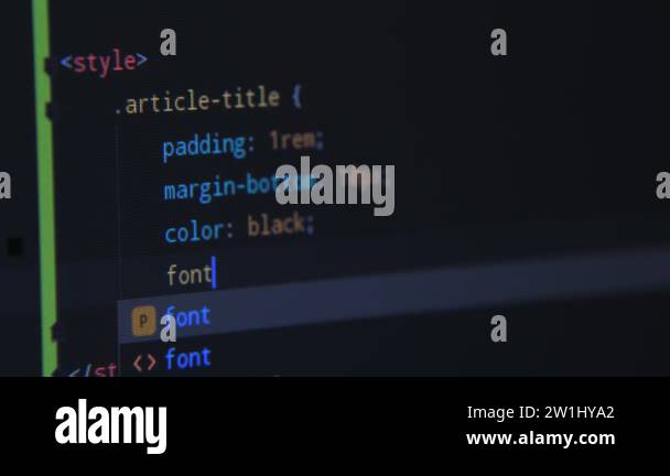 Programming process on a black computer screen with digits, letters put ...