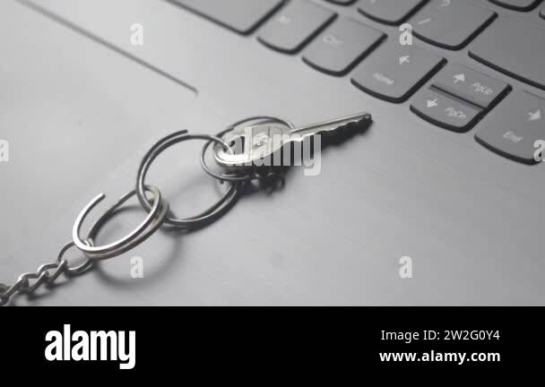 Close up of Still life of Key Ring on laptop computer keyboard ...