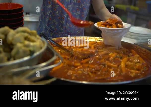 4K Popular Korean street food vendors with delicious Tteok-bokki. Stir