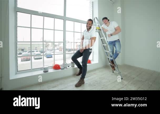 Young ladder Stock Videos & Footage - HD and 4K Video Clips - Alamy