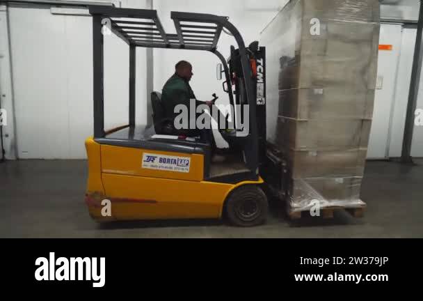 Forklift carries cardboard boxes Stock Videos & Footage - HD and 4K ...