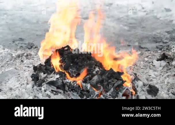 Garbage and fire burn in landfill Stock Video Footage - Alamy