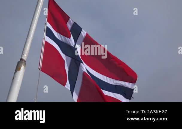 Norway flag waving in the wind on the stern of a cruise ship Stock ...