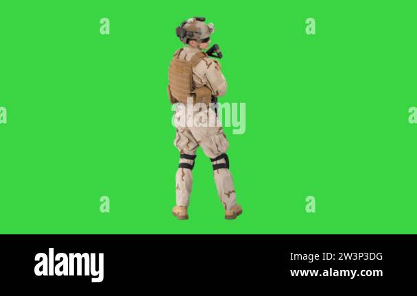 Fully Equipped Solder Holding Assault Rifle and Standing looking to the ...