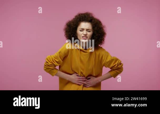 Girl constipation Stock Videos & Footage - HD and 4K Video Clips - Alamy