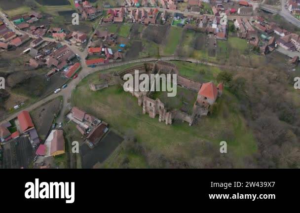 Birds eye view over a medieval fortification ruin shot from a drone ...