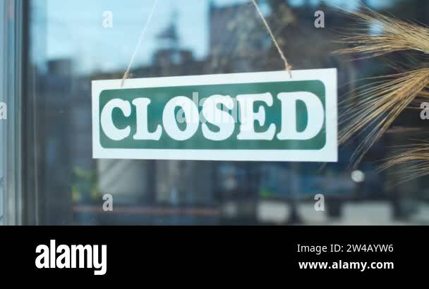 Asian female flower shop owner opening store fo blossoms. Young woman ...