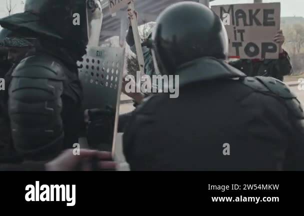 Running in riot gear Stock Videos & Footage - HD and 4K Video Clips - Alamy