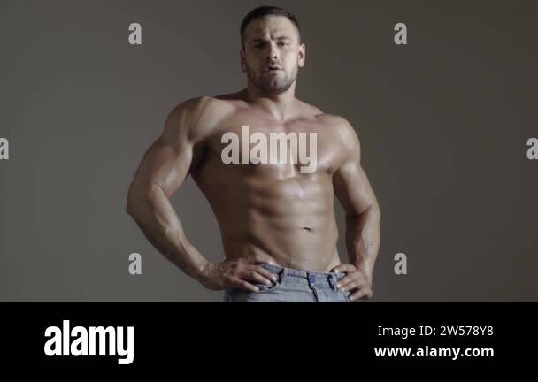 Muscular topless sexy man. Naked bodybuilder. Male hunk with athletic