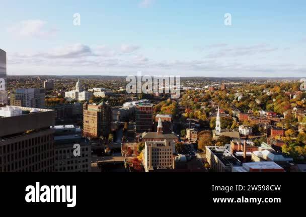 Aerial view flying away from the historic Rhode Island State House with ...