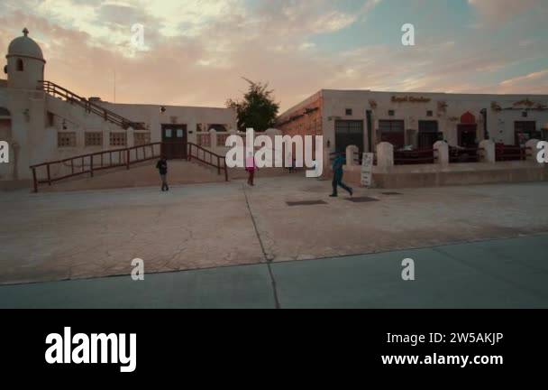 Souq Al Wakra Souk Waqif Al Wakra Heritage Village In Qatar Main Street Panning Shot At Sunset