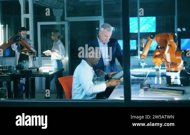 Engineers grasping tricks of smart manufacturing using industrial ...