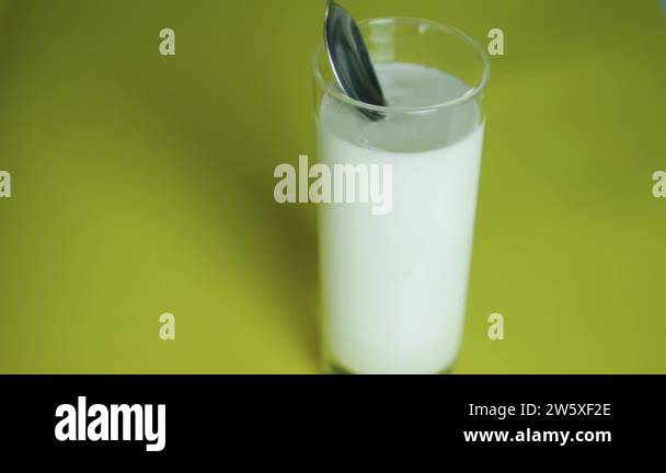 Kefir Sample Collection The expert makes a sample of dairy products, examination of milk for ...