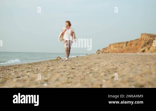 Mature Woman Beach Stock Videos Footage HD And 4K Video Clips Alamy mature-woman-beach-stock-videos-footage-hd-and-4k-video-clips-alamy