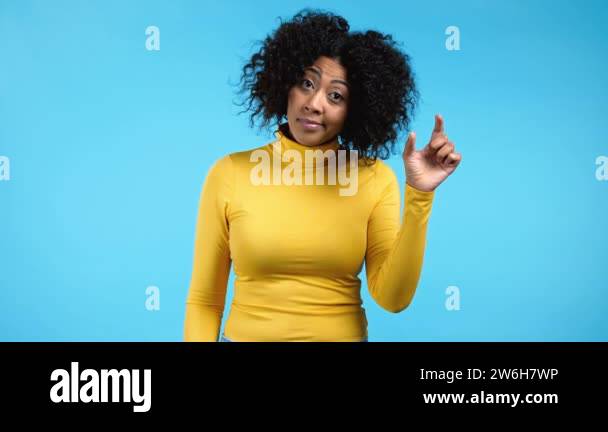 Young african woman showing difference between invisible abstract ...
