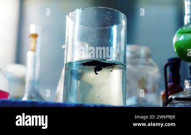 Chemical reaction in front of the camera black chemical substance ...