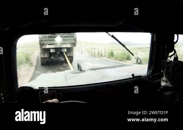Humvee while being towed by troop transport Stock Video Footage - Alamy
