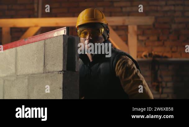 Male builder behind brick wall Stock Videos & Footage - HD and 4K Video ...