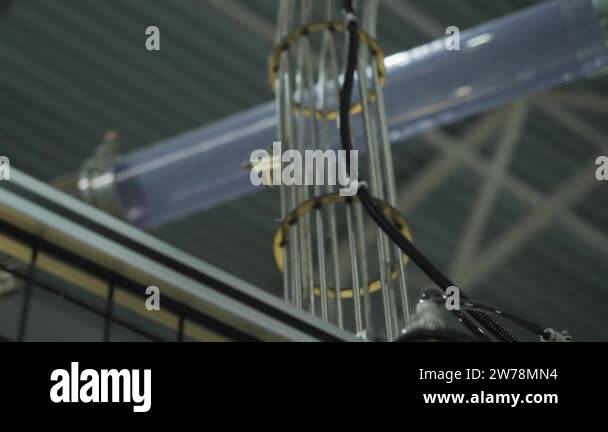 Paper cups are moved to packing area by pneumatic mail. Eco-friendly ...