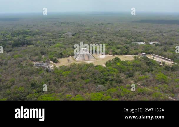 Drone descending and orbiting around historic settlement. Aerial view ...