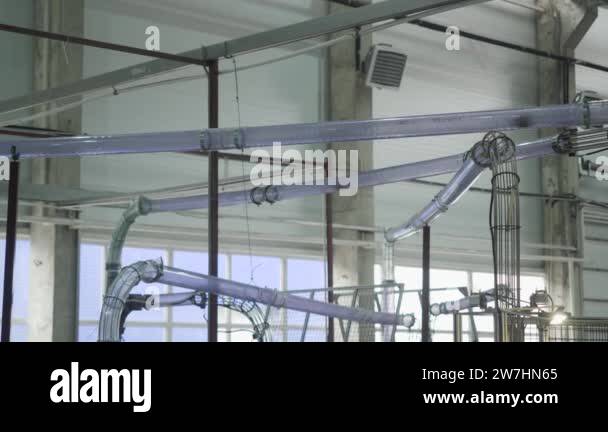 Paper cups are moved to packing area by pneumatic mail. Eco-friendly ...