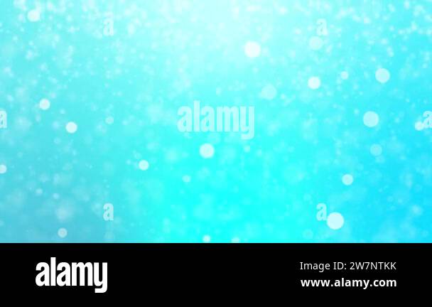 Abstract background with animation of flying particles as bokeh light ...
