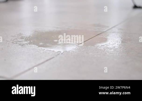 Water drips onto tiled floor Stock Videos & Footage - HD and 4K Video ...
