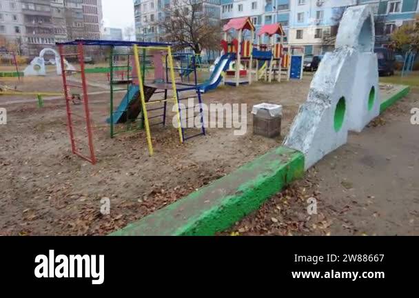 playground in half a multi-storey building. children's carousels on the ...