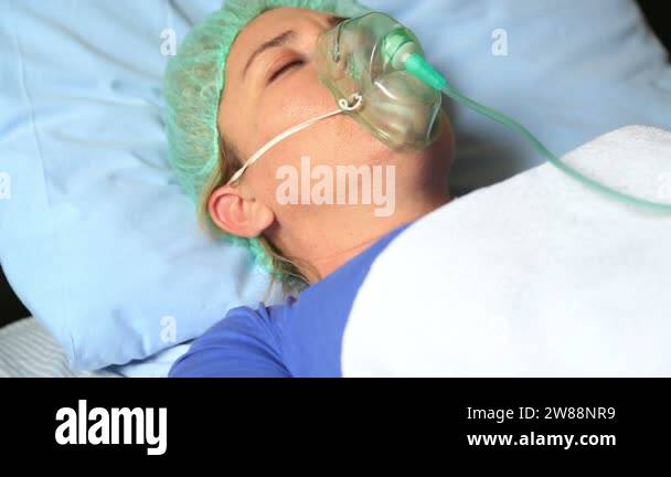 Female patient breathing oxygen mask Stock Videos & Footage - HD and 4K ...