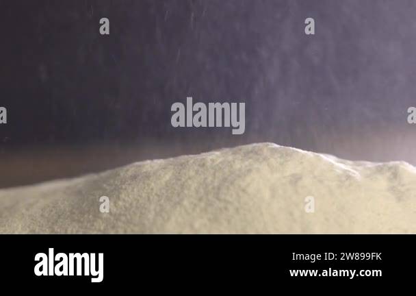 Making cake batter, sifting flour to make it more airy. Super slow ...