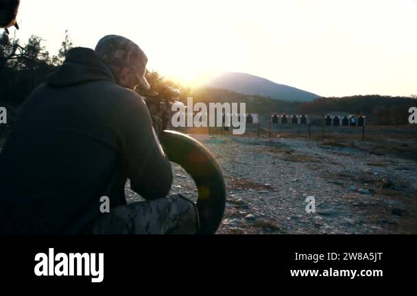 Military specialist from a special forces unit shoots at a tactical ...