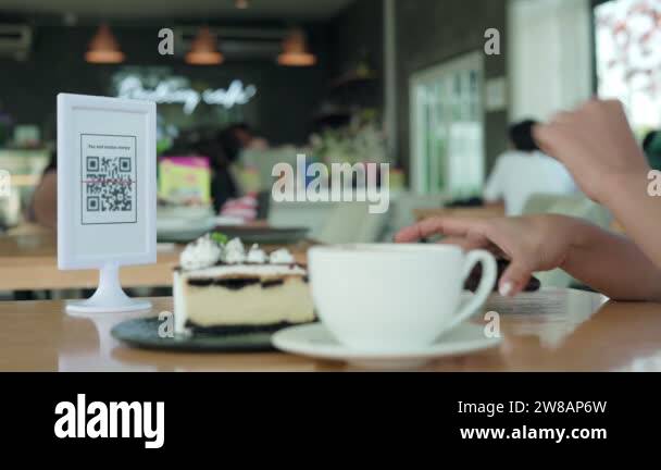 Beautiful woman scan barcodes for order. Women using their mobile ...