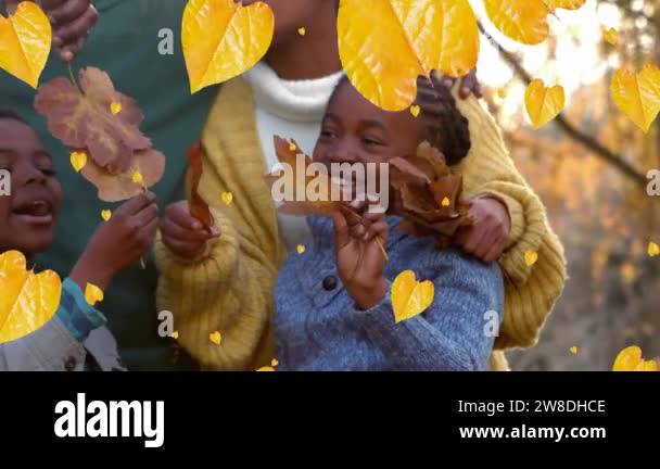 Animation of autumn leaves falling over african american parents with ...