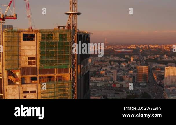 Photo inspiration: Visual Reference: Fly Around Top Of High Rise Building Construction Site Revealing
