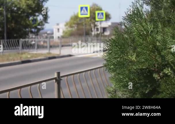 A truck and other cars drives along the highway on a blurred background ...