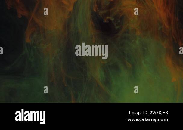 Dissolution of blue particles of luminous colors in a yellow-green ...