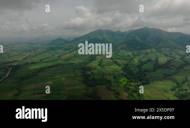 Rice fields and greenland in countryside with green hills. Bukidnon ...