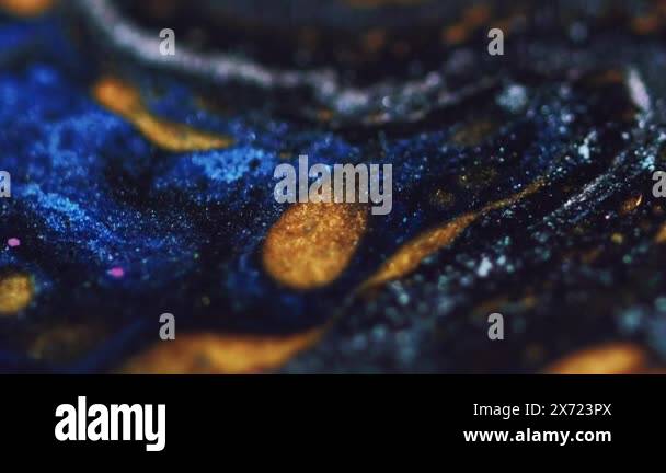 Glitter fluid texture. Oil paint mix. Blur blue golden black color ...